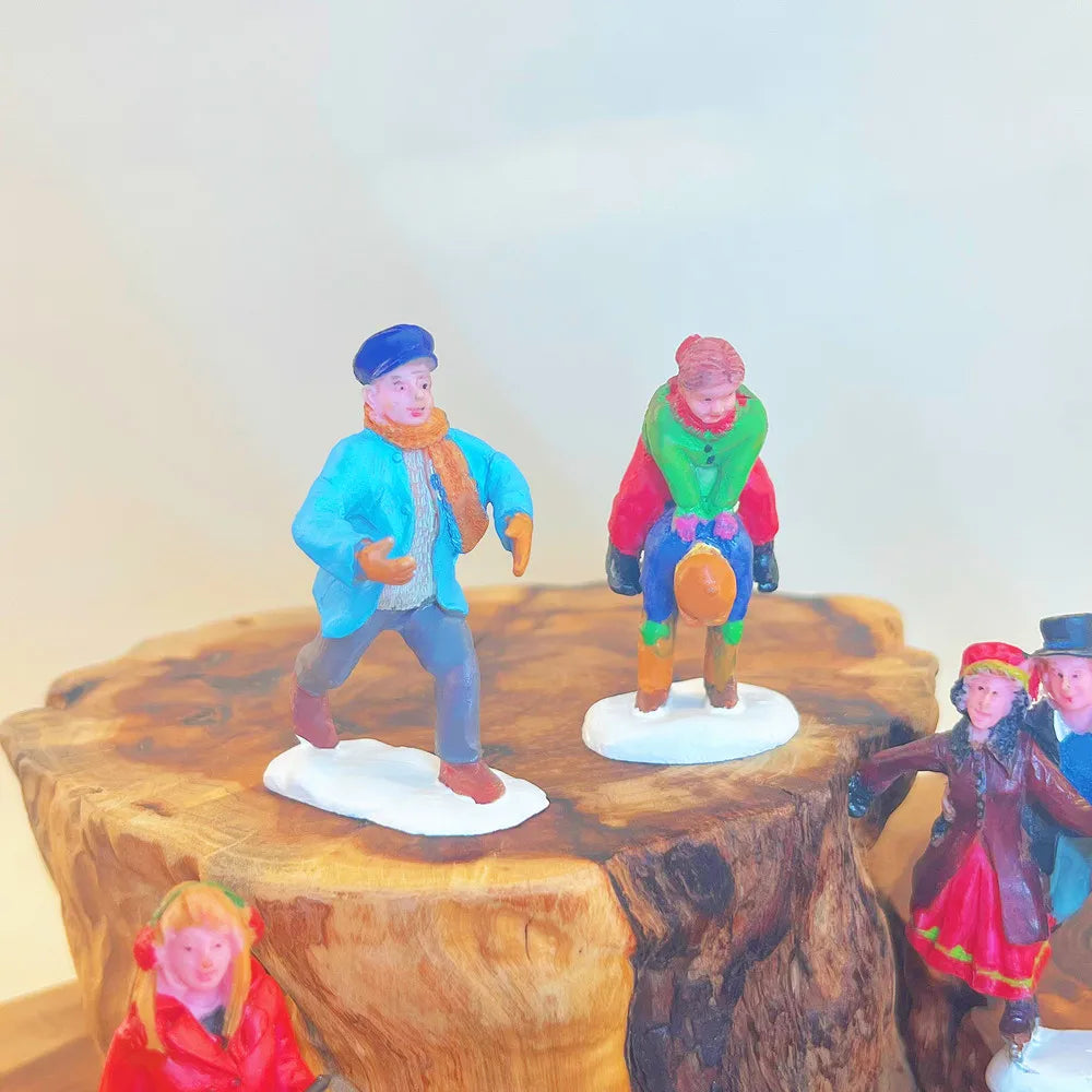 Personnages d'hiver miniatures (patineurs, skieurs…)