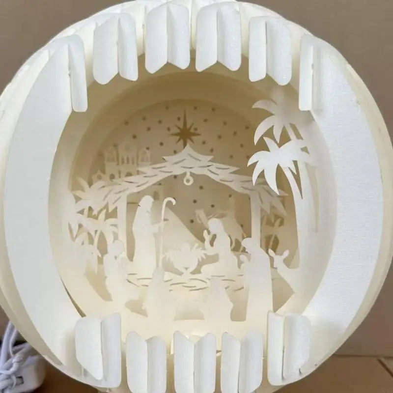 Lanterne lumineuse Nativité en papier découpé
