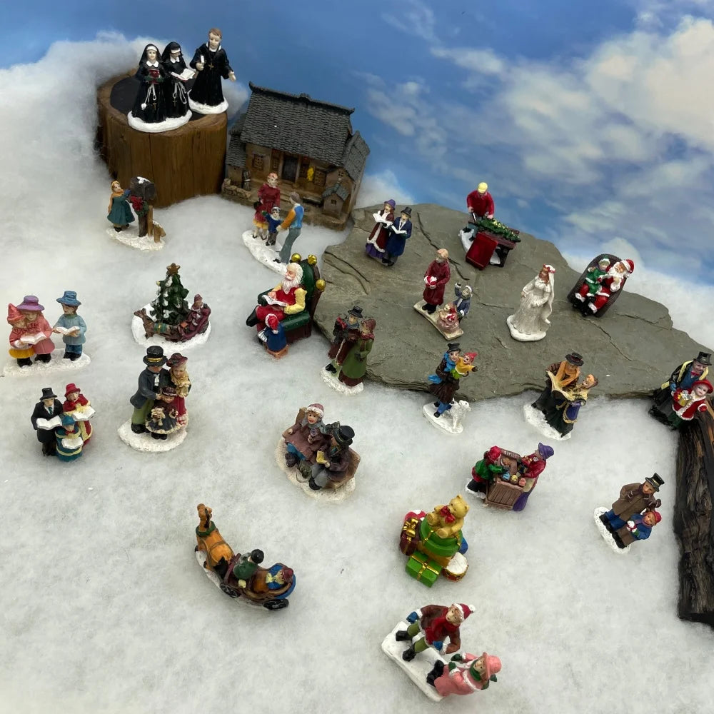 Personnage miniature de village de Noël (à l'unité)