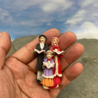 Personnage miniature de village de Noël (à l'unité)