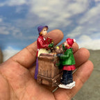 Personnage miniature de village de Noël (à l'unité)