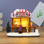 Boutique de village de Noël lumineuse (popcorn, confiserie…)