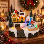 Maison de village de Noël et patinoire tournante