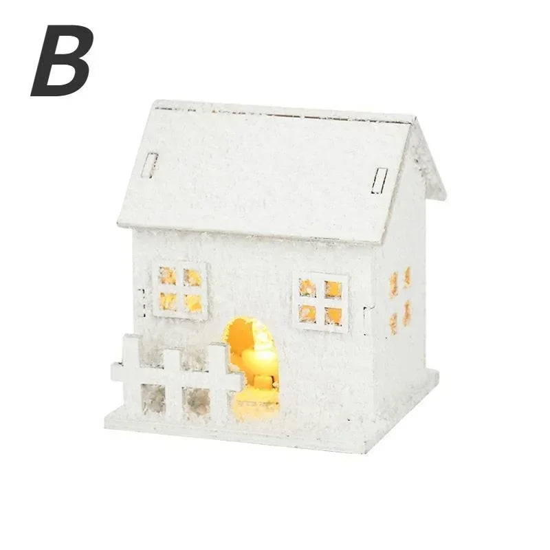 Maison enneigée lumineuse en bois blanc