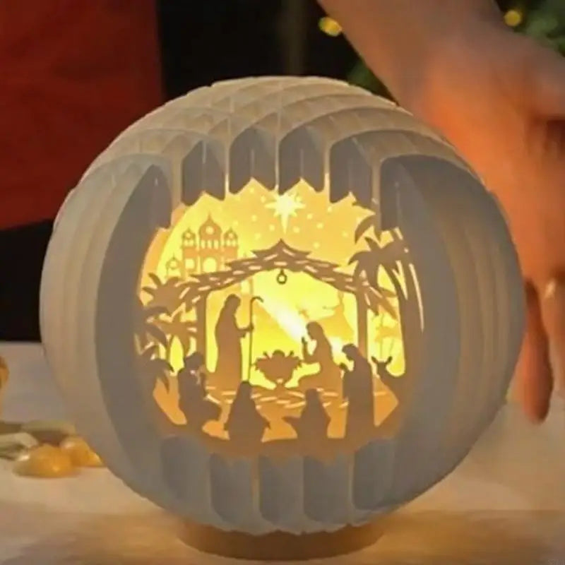Lanterne lumineuse Nativité en papier découpé