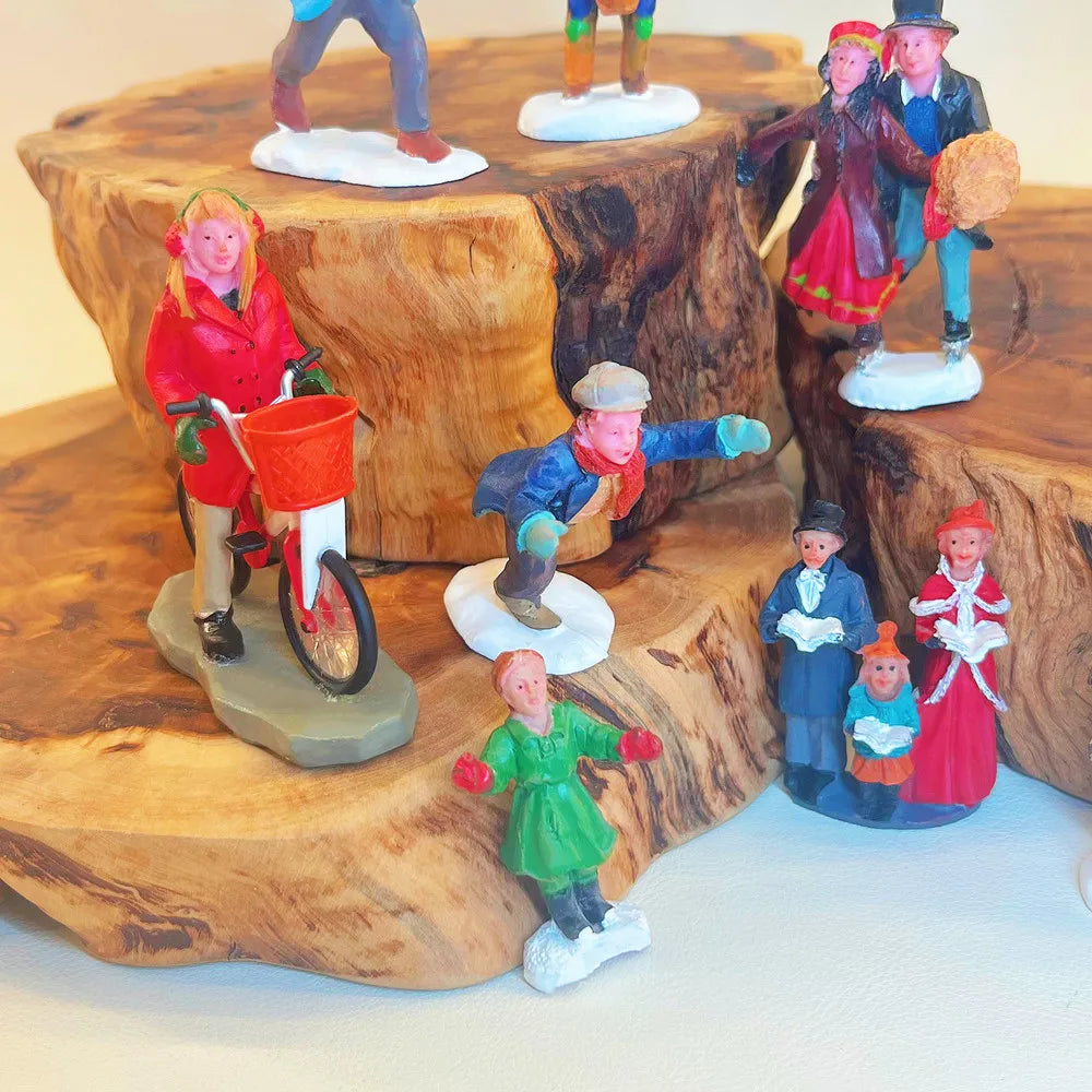 Personnages d'hiver miniatures (patineurs, skieurs…)