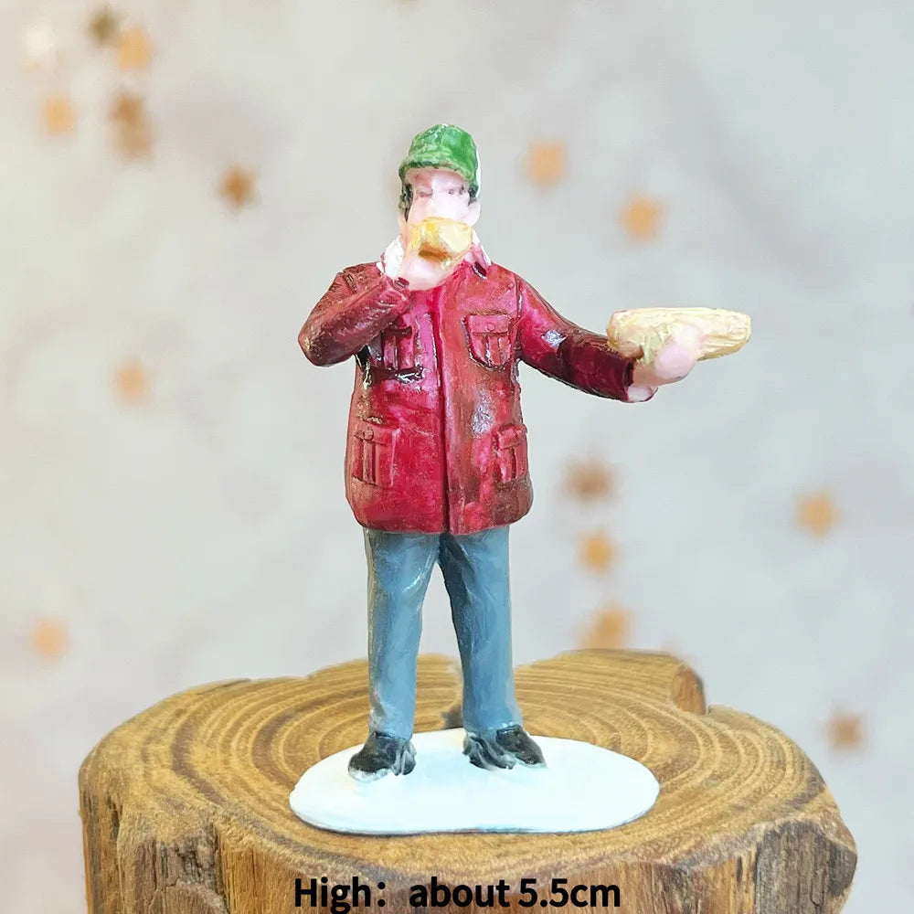 Scène de personnages pour village de Noël