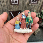Personnage miniature de village de Noël (à l'unité)