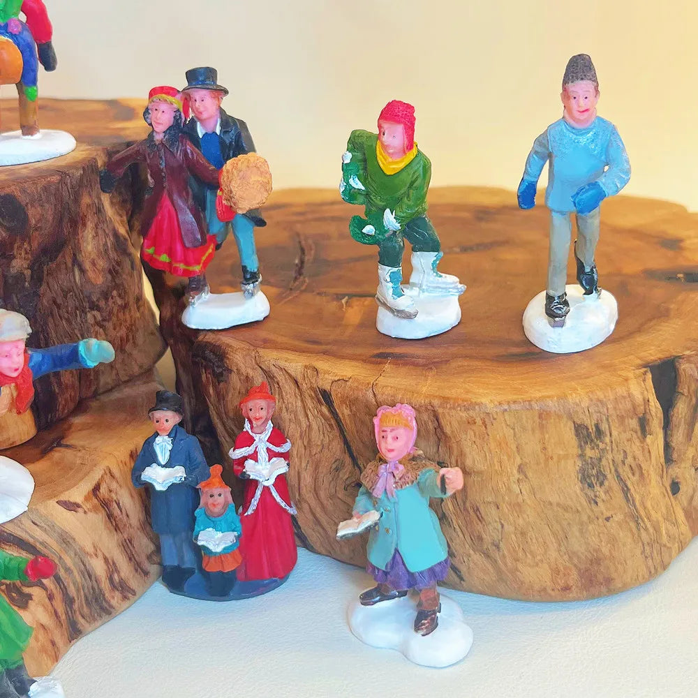 Personnages d'hiver miniatures (patineurs, skieurs…)
