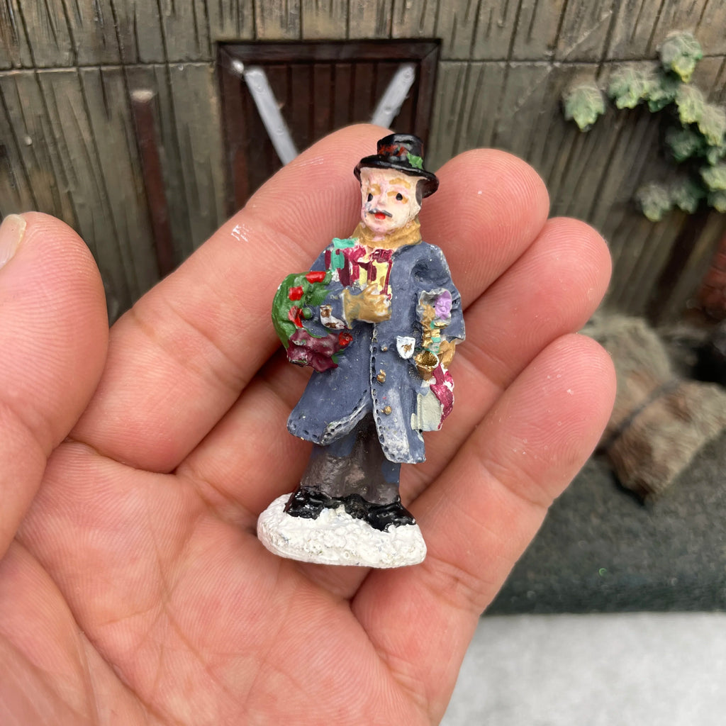 Personnage miniature de village de Noël (à l'unité)