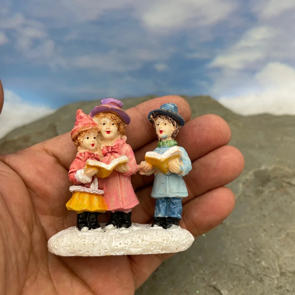 Personnage miniature de village de Noël (à l'unité)