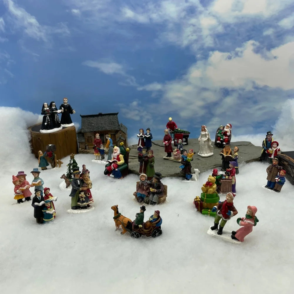 Personnage miniature de village de Noël (à l'unité)