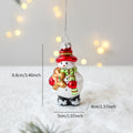 Suspension de Noël en verre peint (Père Noël, bonhomme de neige…)