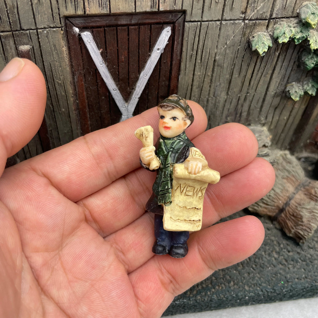 Personnage miniature de village de Noël (à l'unité)