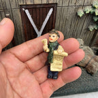 Personnage miniature de village de Noël (à l'unité)