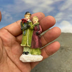 Personnage miniature de village de Noël (à l'unité)