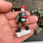 Personnage miniature de village de Noël (à l'unité)