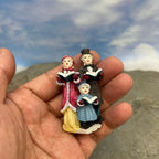 Personnage miniature de village de Noël (à l'unité)