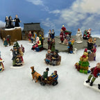 Personnage miniature de village de Noël (à l'unité)